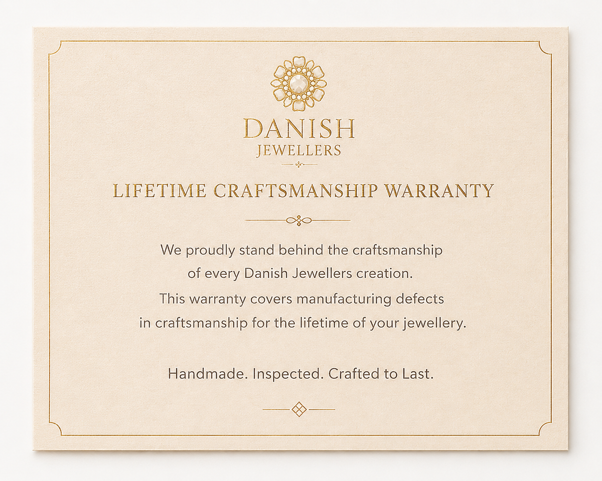 Danish Jewellers lifetime craftsmanship warranty card on a white background