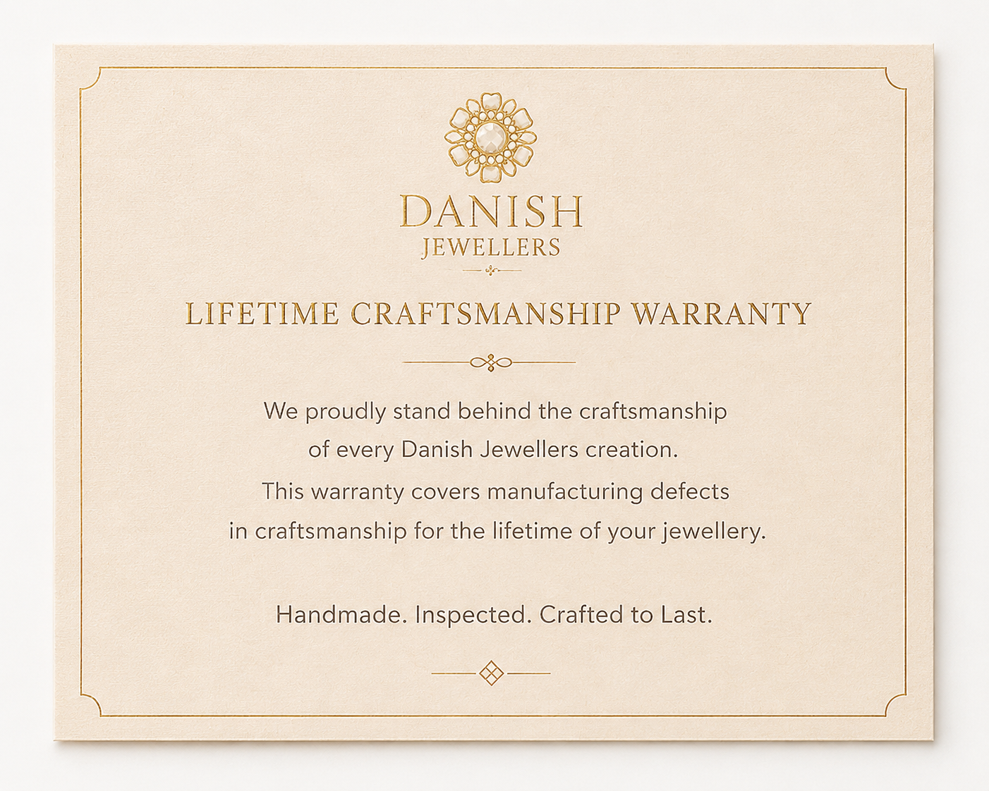 Danish Jewellers lifetime craftsmanship warranty card on a white background